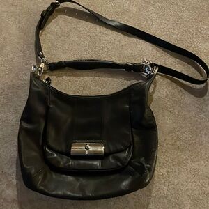 Coach black leather handle bag with detachable 40” leather shoulder strap.